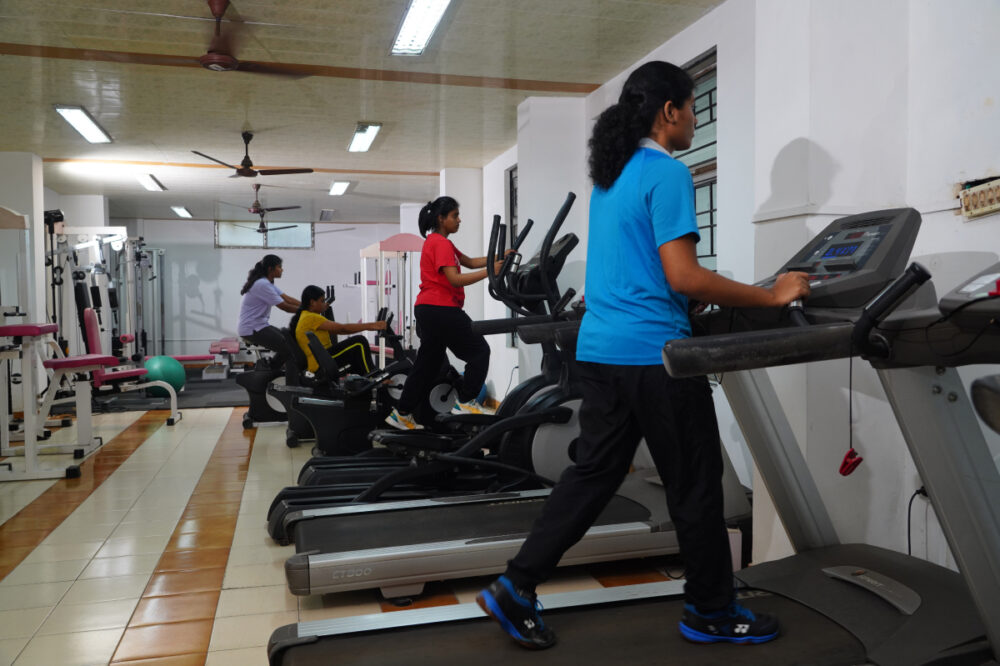 Girls using the hostel gymnasium