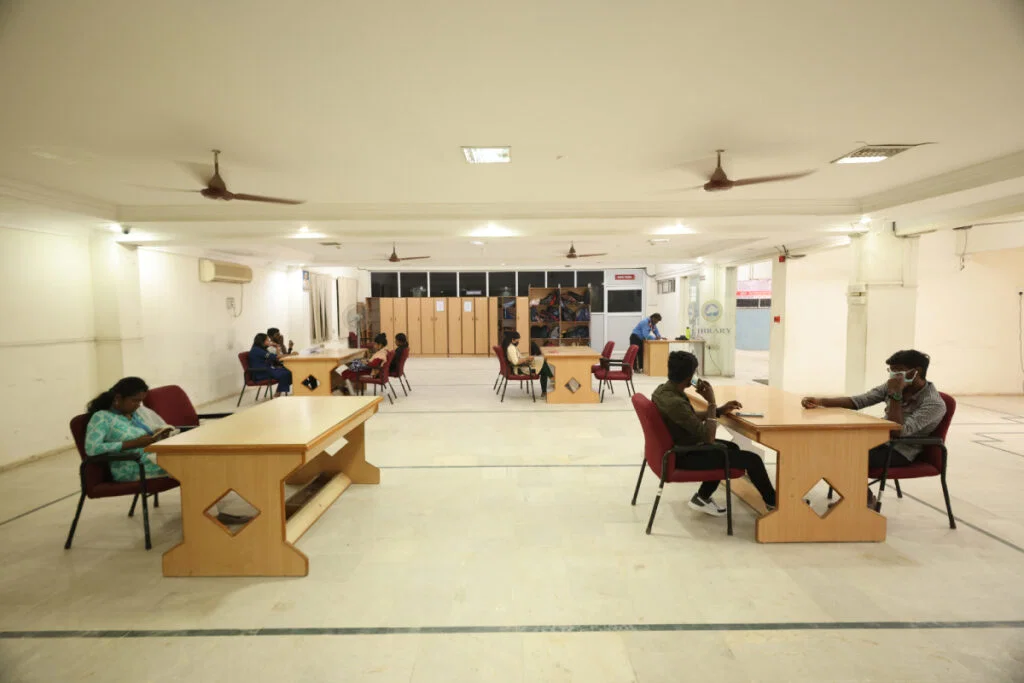 Students studying in the library reading hall